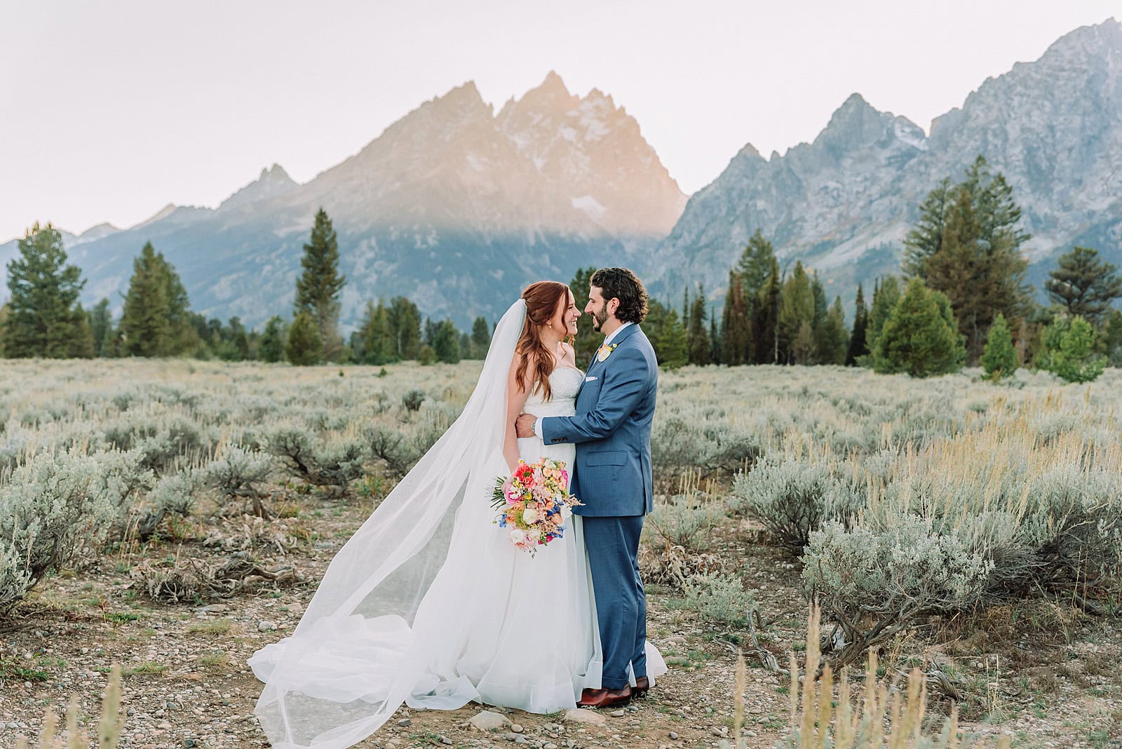 Grand Teton Elopement Photographer romantic wedding dresses outdoor wedding small intimate wedding ideas mountain wedding nature wedding timeless wedding classy wedding elopement elopement photography destination wedding Jackson Hole Wedding Photographer mountain view turnout wedding