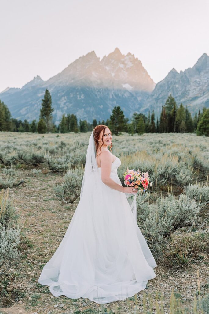 Grand Teton Elopement Photographer romantic wedding dresses outdoor wedding small intimate wedding ideas mountain wedding nature wedding timeless wedding classy wedding elopement elopement photography destination wedding Jackson Hole Wedding Photographer mountain view turnout wedding