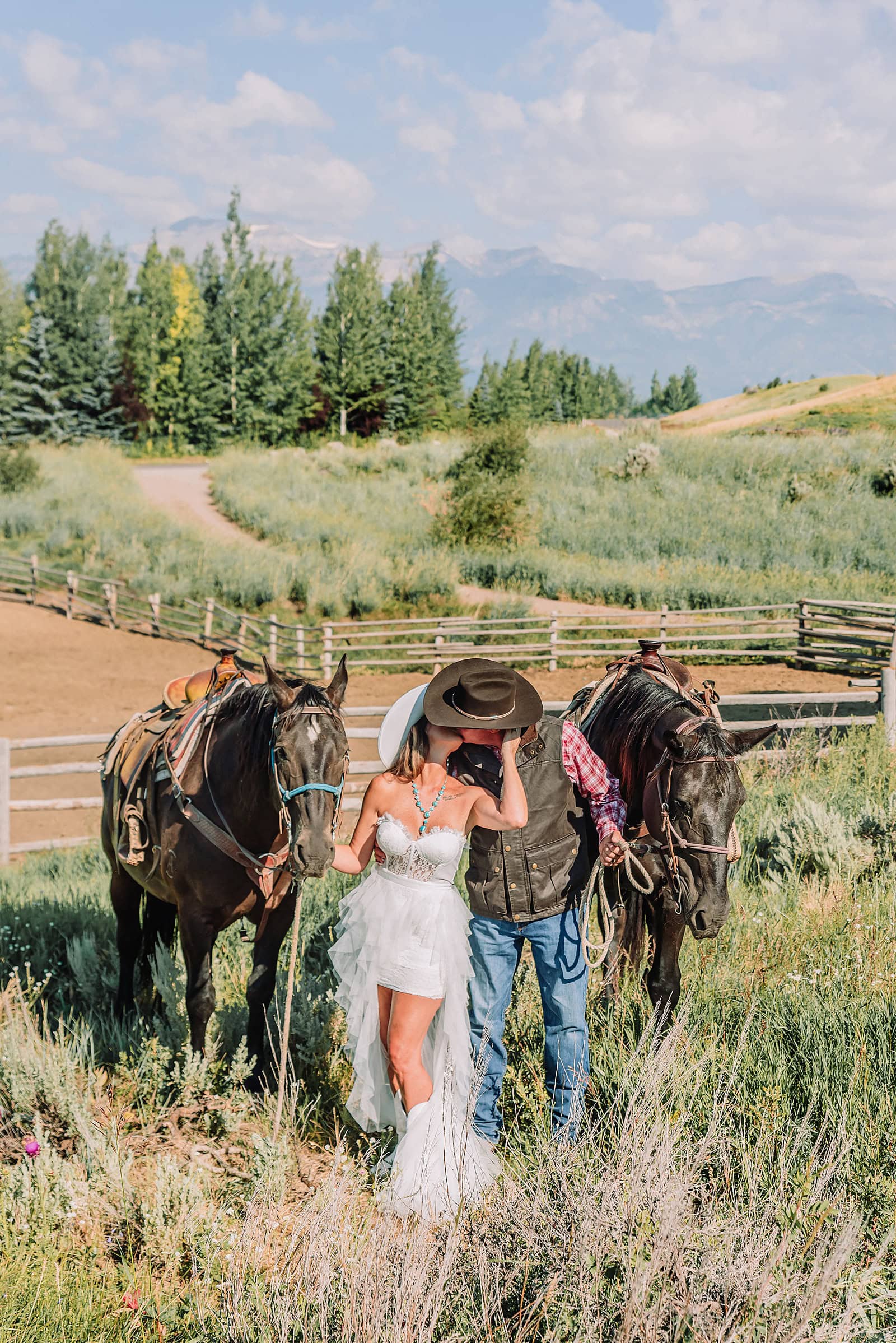 jackson hole elopement at spring creek ranch summer elopement in Grand Teton National Park summer wedding in Jackson Hole Grand Teton National Park wedding Jackson Hole summer wedding summer wedding in Wyoming Romantic summer elopement in the Tetons Western-themed elopement in Wyoming Adventure elopements in Jackson Hole Romantic horseback elopement in the Tetons Horseback riding elopement in Jackson Hole spring creek ranch horseback riding elopement