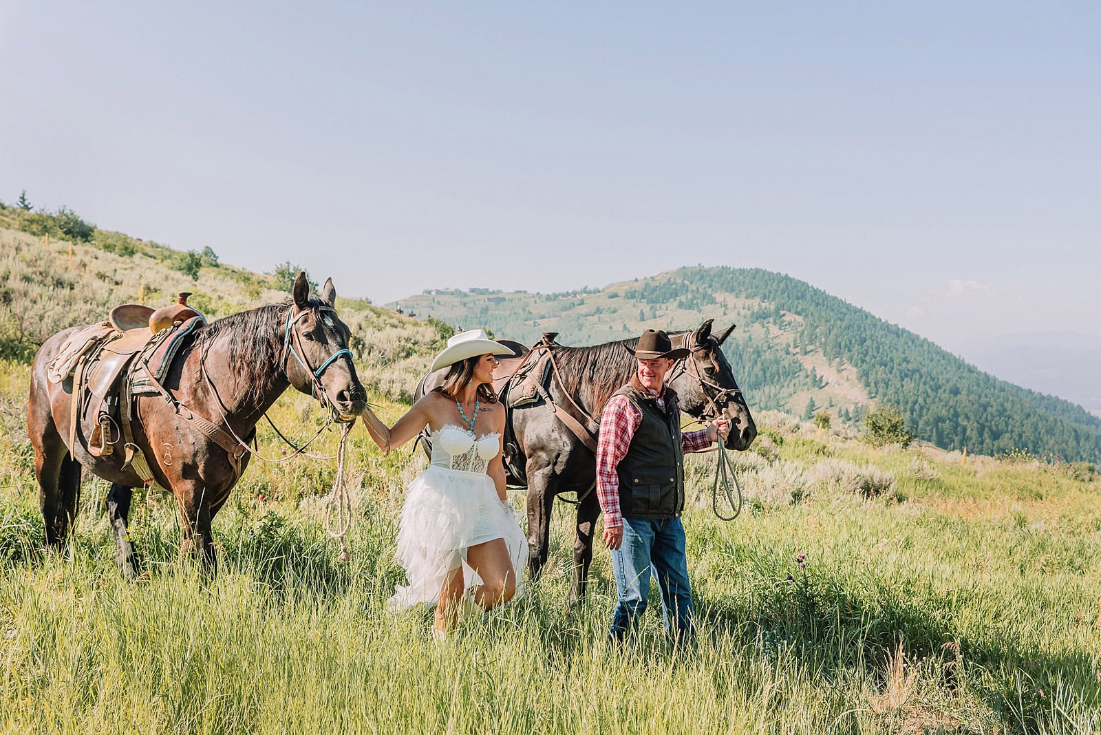 jackson hole elopement at spring creek ranch summer elopement in Grand Teton National Park summer wedding in Jackson Hole Grand Teton National Park wedding Jackson Hole summer wedding summer wedding in Wyoming Romantic summer elopement in the Tetons Western-themed elopement in Wyoming Adventure elopements in Jackson Hole Romantic horseback elopement in the Tetons Horseback riding elopement in Jackson Hole spring creek ranch horseback riding elopement