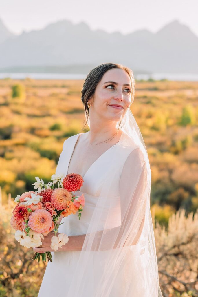 Romantic fall elopement in the Tetons elopement at Colter Bay Grand Teton National Park elopement photographer Jackson Hole elopement packages Wedding venues in Grand Teton National Park Scenic wedding spots in Jackson Hole Fall foliage wedding in Grand Teton