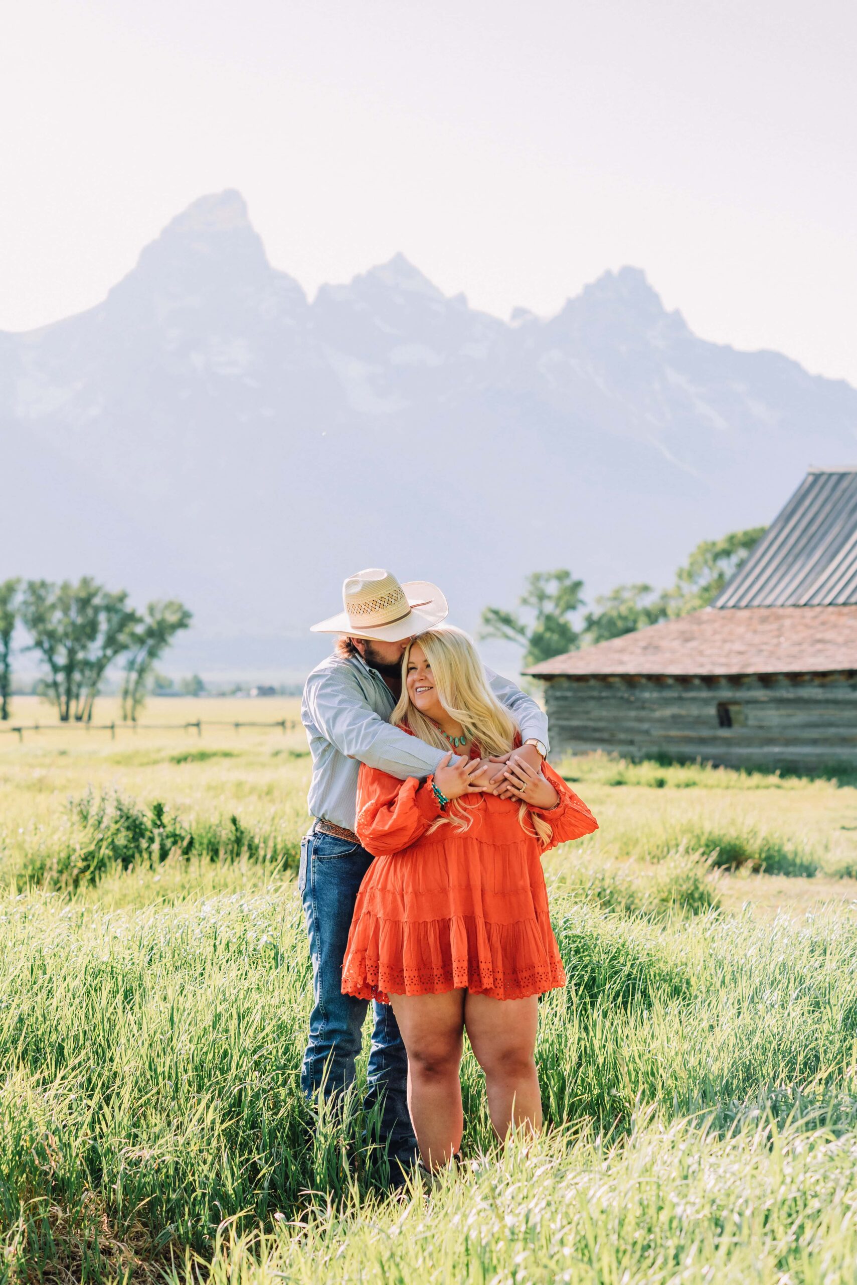 jackson hole engagement photographer engagement photo ideas spring summer engagement photo ideas grand teton engagement photos anniversary photos jackson hole photographer poses for couples