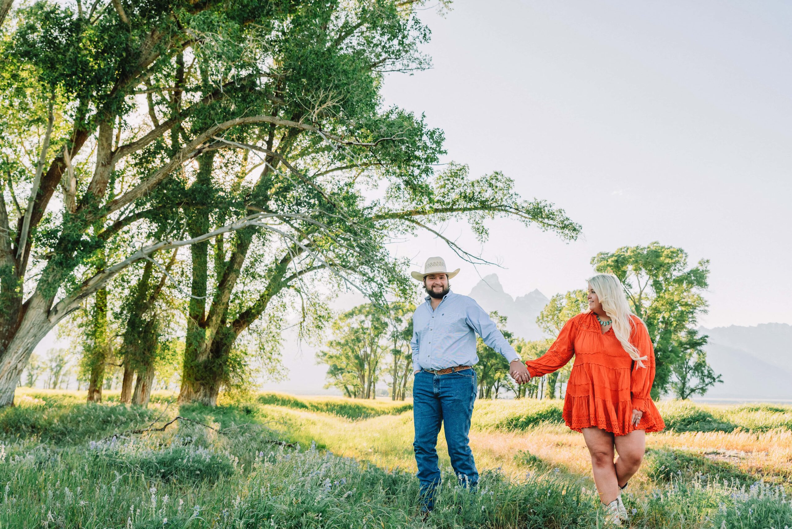 mormon row jackson hole engagement photographer engagement photo ideas spring summer engagement photo ideas grand teton engagement photos anniversary photos jackson hole photographer poses for couples