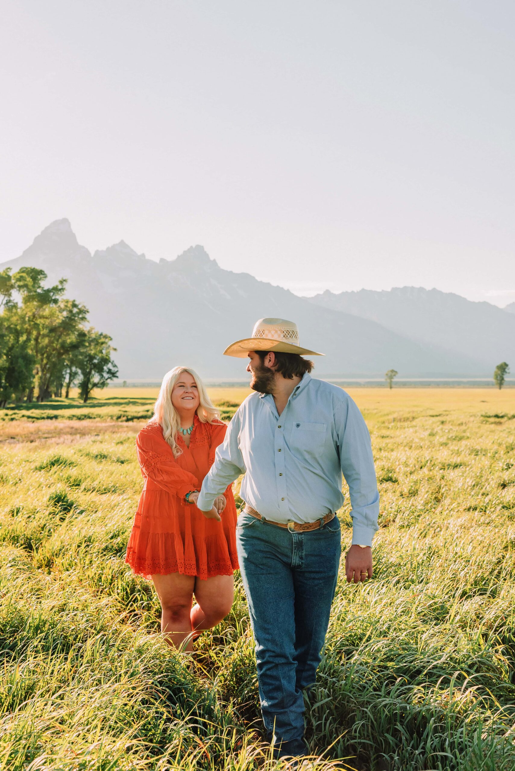 mormon row jackson hole engagement photographer engagement photo ideas spring summer engagement photo ideas grand teton engagement photos anniversary photos jackson hole photographer poses for couples