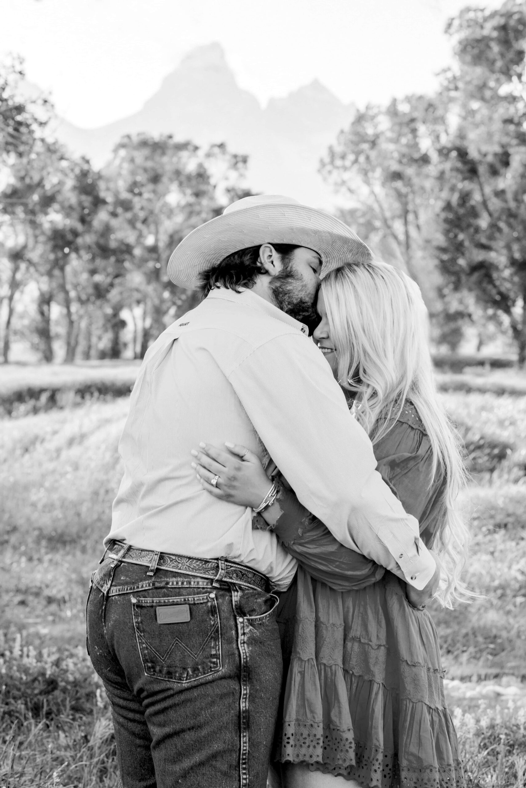 mormon row jackson hole engagement photographer engagement photo ideas spring summer engagement photo ideas grand teton engagement photos anniversary photos jackson hole photographer poses for couples