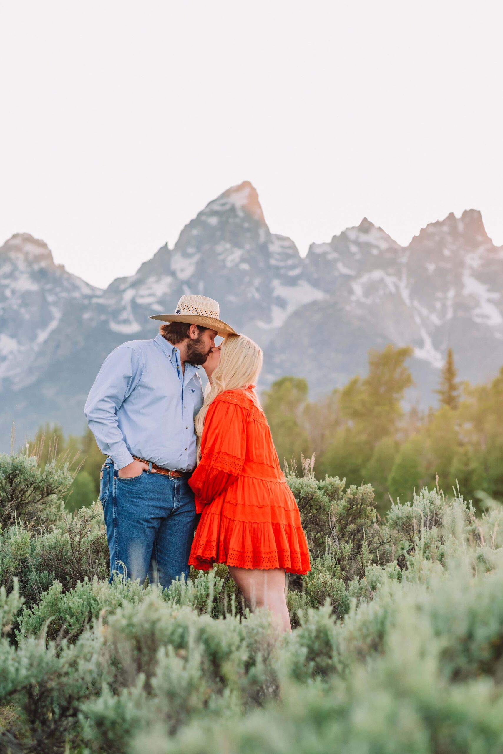 jackson hole photography schwabacher landing couple portraits in jackson hole colorful and vibrant photography engagement photo ideas