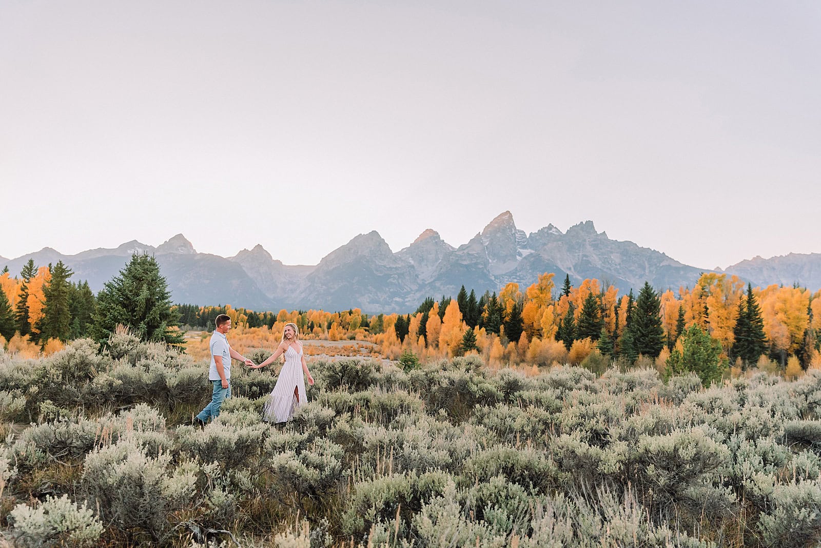 jackson hole engagement photographer engagement photo ideas spring summer engagement photo ideas grand teton engagement photos anniversary photos jackson hole photographer poses for couples