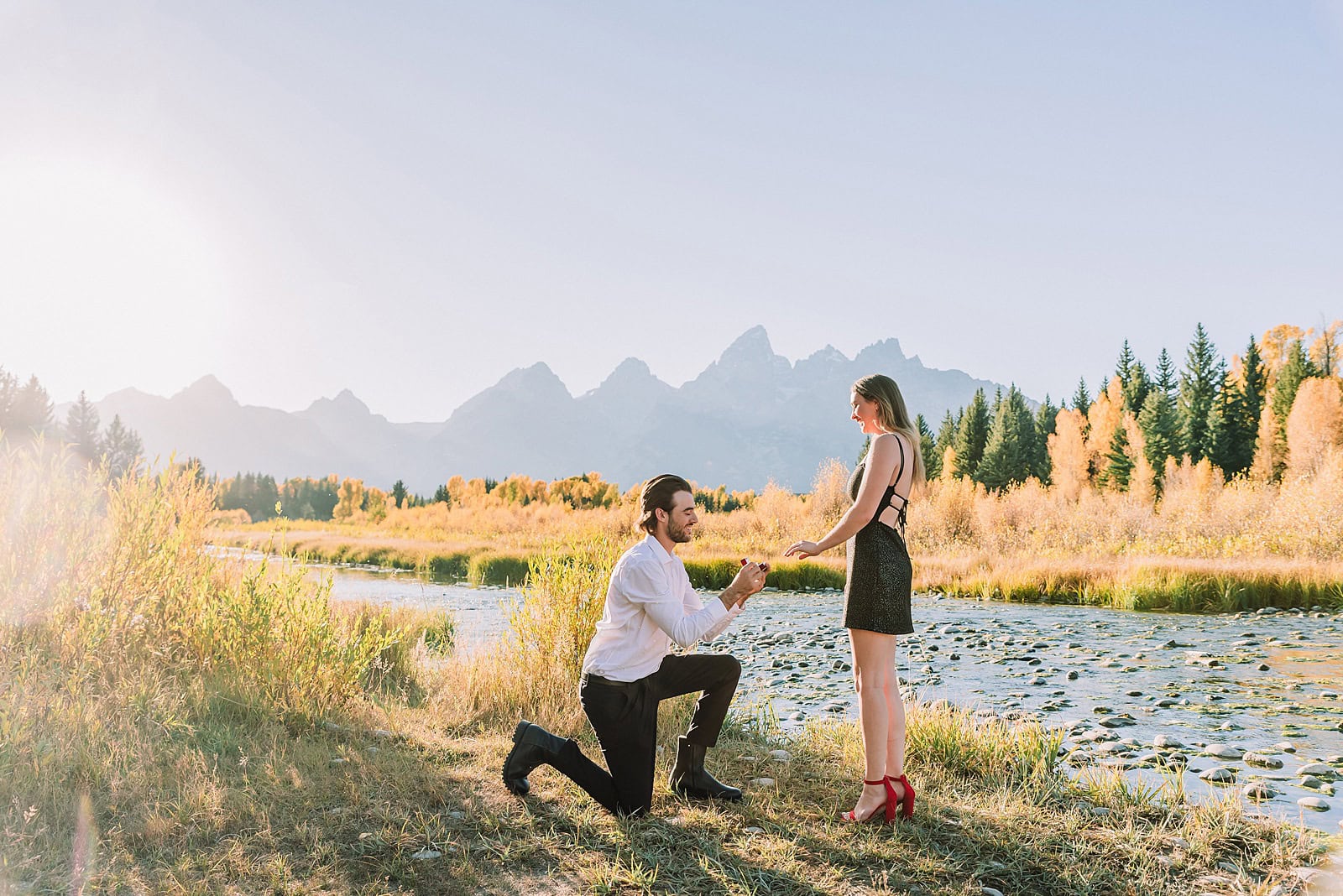 jackson hole engagement photographer grand teton engagement photos jackson wyoming engagement photos fall photo outfit ideas fall engagement pictures jackson hole photographer jackson hole proposal photographer engagement photographer near me wedding proposal