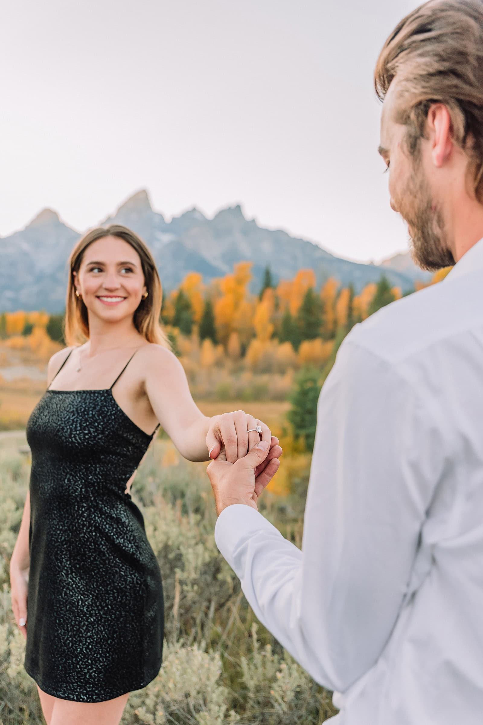 poses for couples jackson hole proposal photographer fall engagement photo outfits engagement photography near me wyoming photographer grand teton engagement photos grand teton engagement photographer