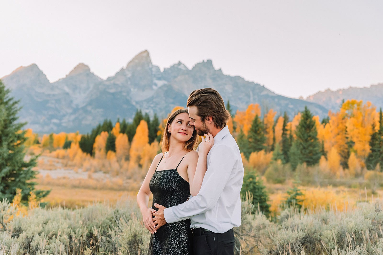jackson hole engagement photographer grand teton engagement photos jackson wyoming engagement photos fall photo outfit ideas fall engagement pictures jackson hole photographer jackson hole proposal photographer engagement photographer near me