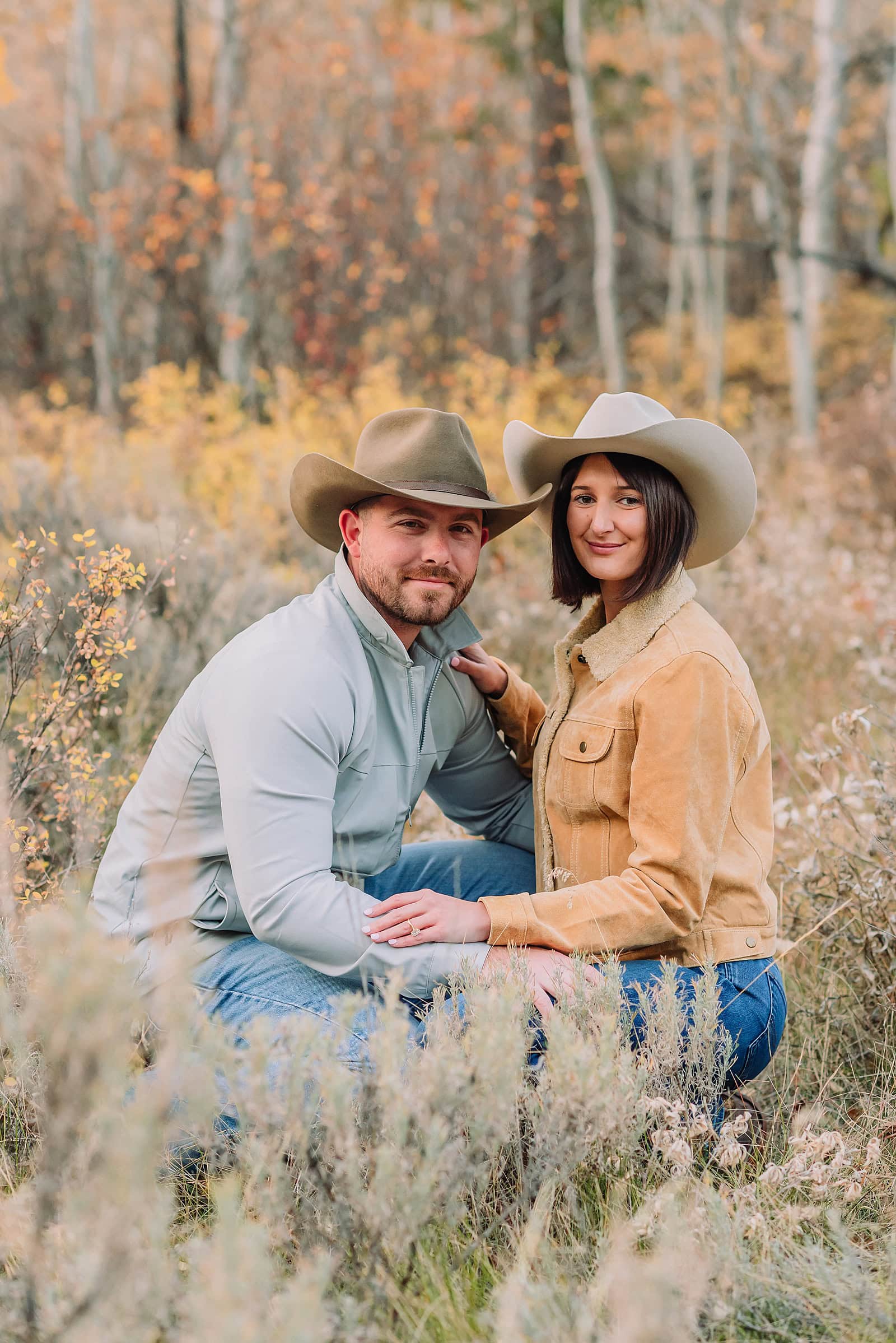 Jackson Wyoming Engagement Photos poses for couples jackson hole proposal photographer fall engagement photo outfits engagement photography near me wyoming photographer