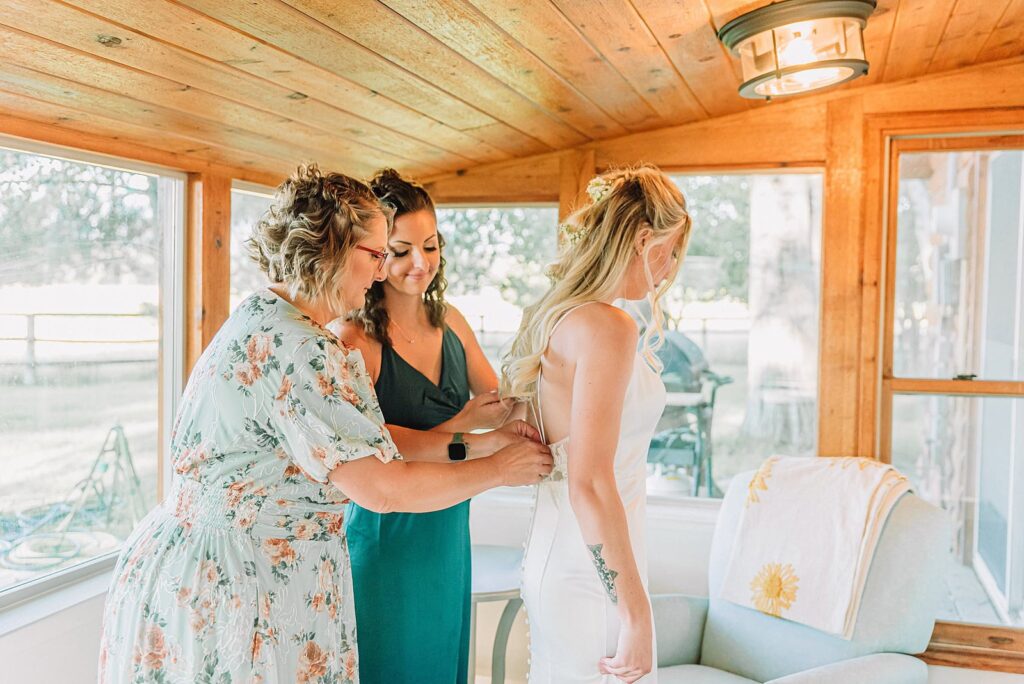 getting ready photos of the bride bride wedding dress bridesmaids mother of the bride wedding colors