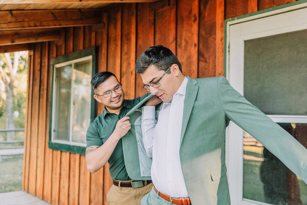 wedding party getting ready photos on wedding day groomsmen and groom best man wedding attire