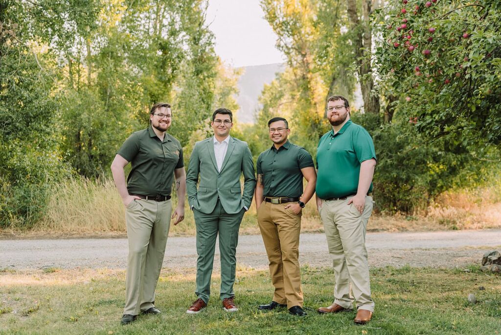 wedding party getting ready photos on wedding day groomsmen and groom best man wedding attire