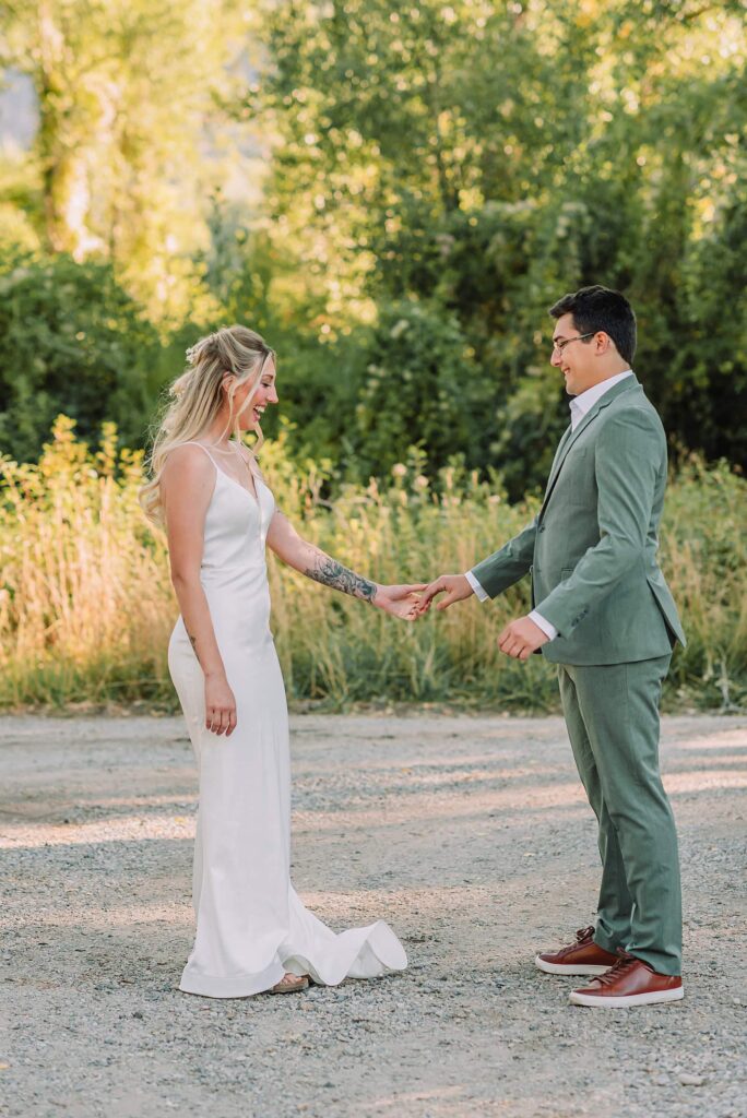 Idaho Photographer Near Me Island Park Wedding Photographer Rexburg Wedding Photographer Micro Wedding in Idaho Jackson Hole Weddings Fall Wedding Bride and groom first look on wedding day