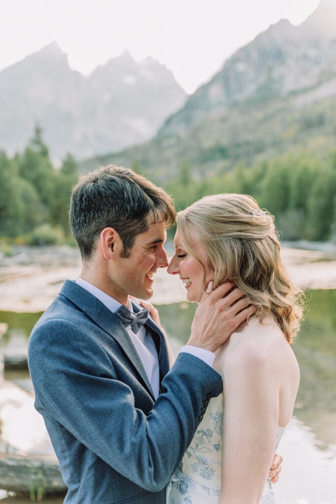 couple posing ideas for newlyweds, snuggle with noses touching and soft smile