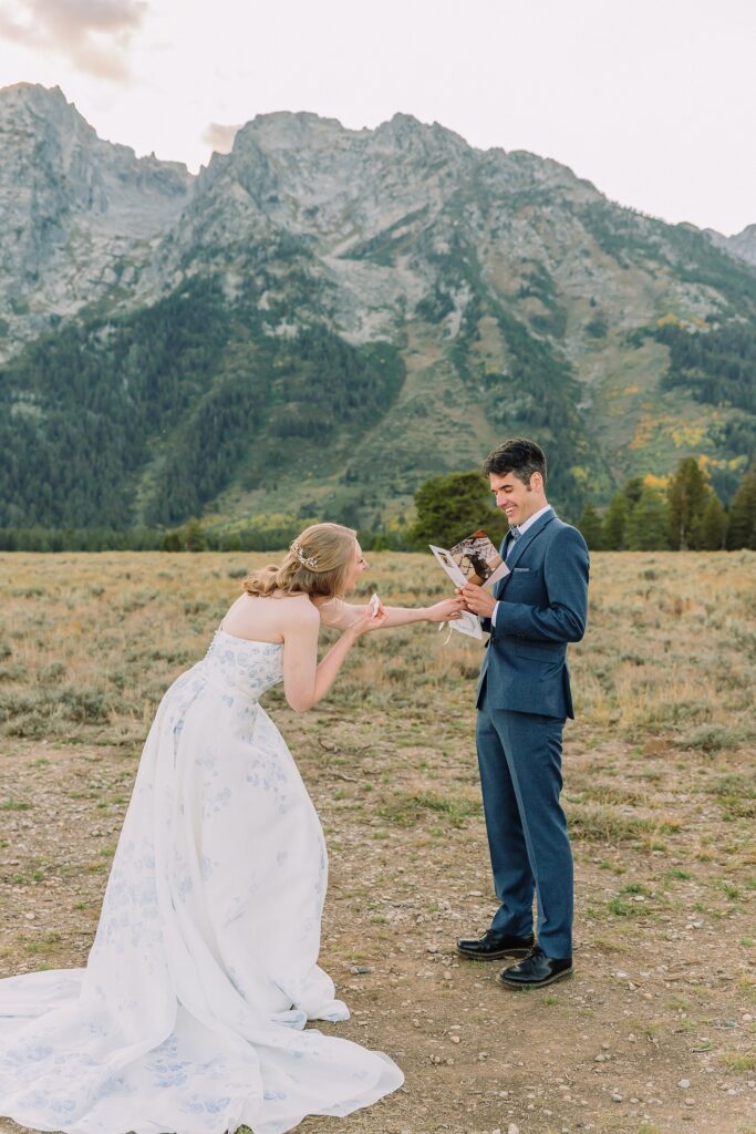 bride and groom share vows while wedding officiant performs ceremony at Cathedral Group Turnout