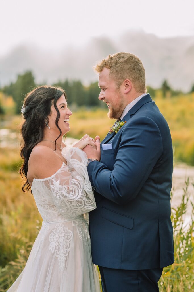 bride and groom at schwabacher landing in Grand Teton Elopement