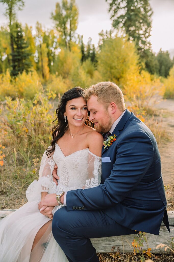 bride and groom at schwabacher landing in Grand Teton Elopement