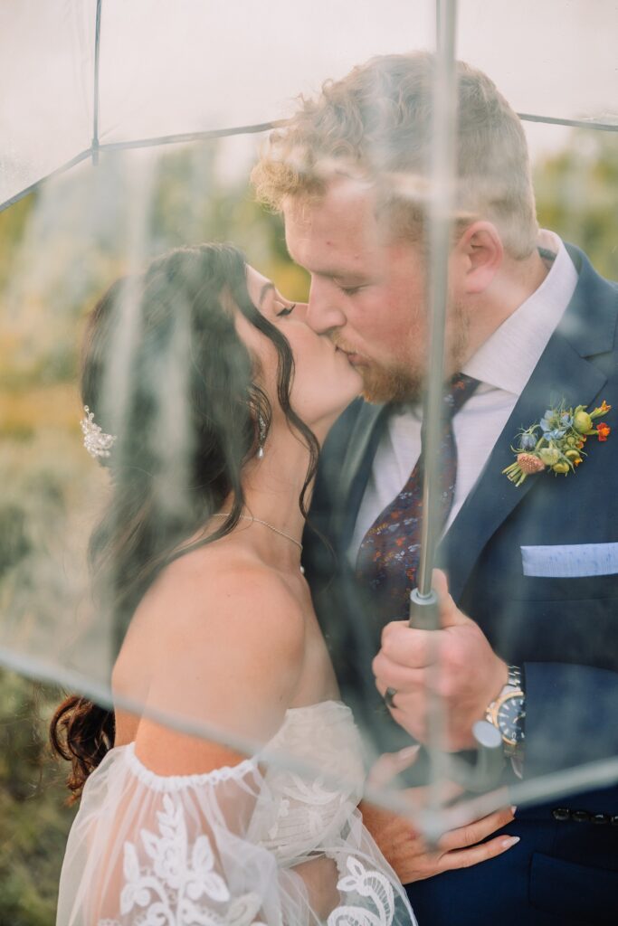 bride and groom at schwabacher landing in Grand Teton Elopement