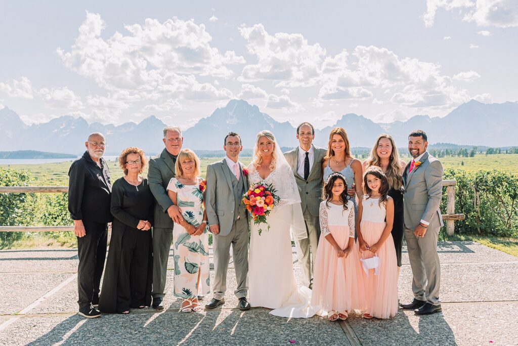 Jackson Hole luxury mountain wedding reception Jackson Hole destination wedding photographer sunset wedding portraits in the Tetons intimate Jackson Lake Lodge wedding celebration summer wedding in grand teton national park