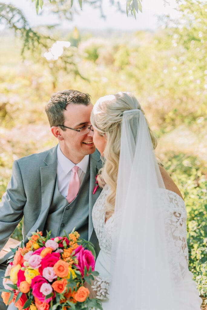 Jackson Lake Lodge wedding with Mount Moran view July wedding at Jackson Lake Lodge Wyoming Wyoming destination wedding in the Tetons outdoor wedding ceremony in Grand Teton National Park Grand Teton National Park wedding photographer
