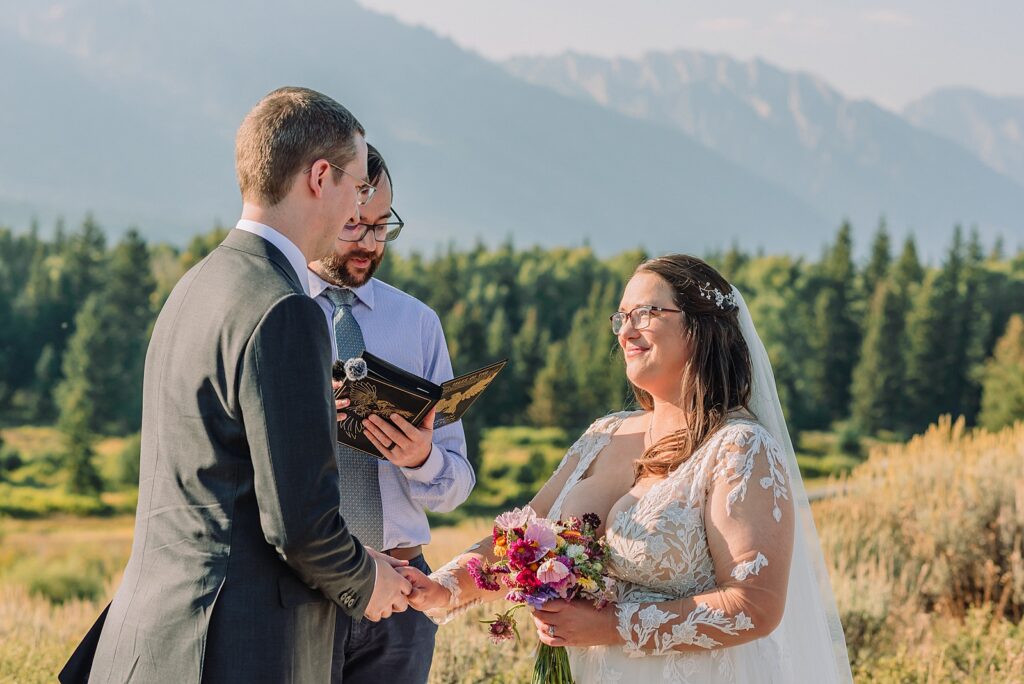 Grand Teton National Park intimate wedding ceremony Blacktail Ponds Overlook elopement photography vegan wedding cupcakes Wyoming baker Brandon Sanderson Cosmere themed wedding details dispersed ceremony permit Grand Teton wedding
