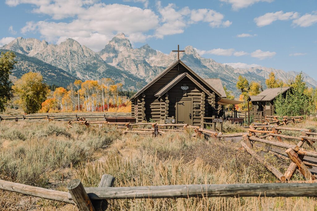 historic chapel wedding Wyoming mountains intimate wedding Chapel of the Transfiguration family photos Chapel of the Transfiguration wedding ceremony Grand Teton bride in mother's wedding dress teal boots fall wedding Chapel of the Transfiguration September Grand Teton National Park micro wedding