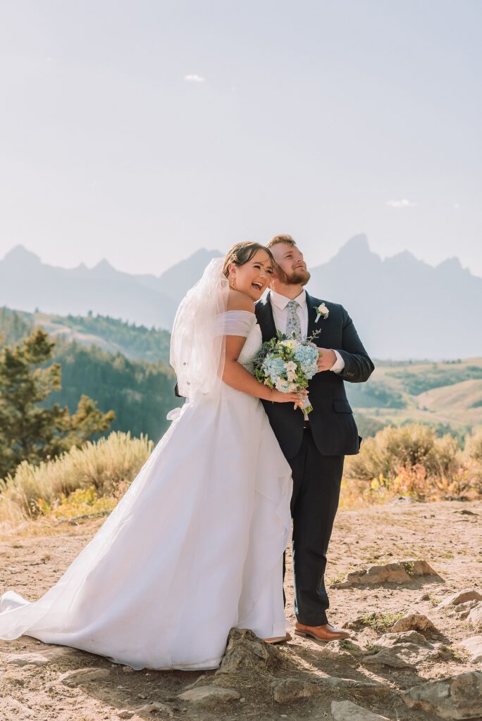 The Wedding Tree ceremony photos Wyoming bride wearing mother's wedding dress mountain elopement with Teton backdrop small intimate wedding ceremony ideas intimate outdoor Wyoming wedding inspiration