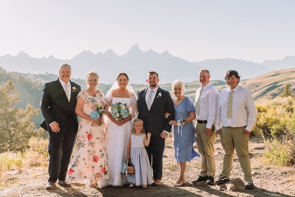 The Wedding Tree ceremony photos Wyoming bride wearing mother's wedding dress mountain elopement with Teton backdrop small intimate wedding ceremony ideas intimate outdoor Wyoming wedding inspiration