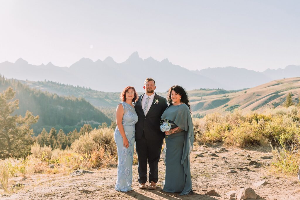 The Wedding Tree ceremony photos Wyoming bride wearing mother's wedding dress mountain elopement with Teton backdrop small intimate wedding ceremony ideas intimate outdoor Wyoming wedding inspiration