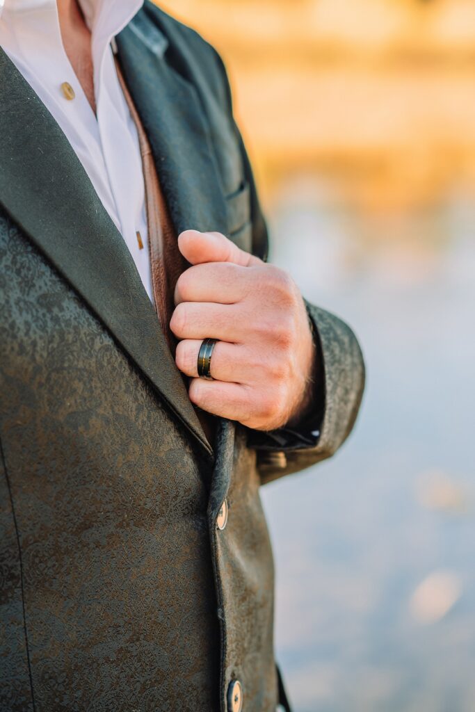 Jackson Hole honeymoon wedding photos Schwabacher Landing wedding portraits Snake River wedding photography September mountain wedding photos beaded wedding dress golden hour western groom style wedding photos Teton mountain wedding portraits sheer cape wedding dress photography