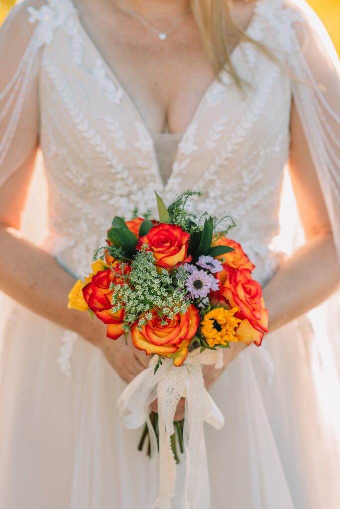 Jackson Hole honeymoon wedding photos Schwabacher Landing wedding portraits Snake River wedding photography September mountain wedding photos beaded wedding dress golden hour western groom style wedding photos Teton mountain wedding portraits sheer cape wedding dress photography