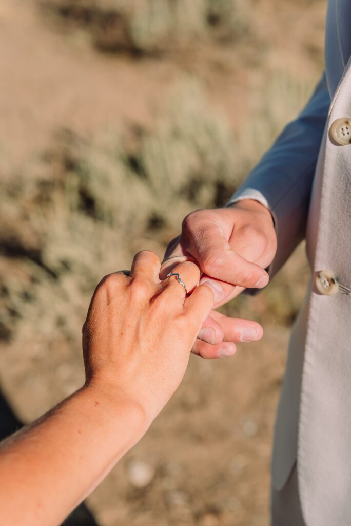 Cathedral View Turnout elopement ceremony Grand Teton National Park bride on horse Grand Teton elopement couple running down road Grand Teton elopement Jackson Hole micro wedding photographer how to get married in grand teton national park western wedding at Cathedral View Turnout horses in western wedding jackson hole