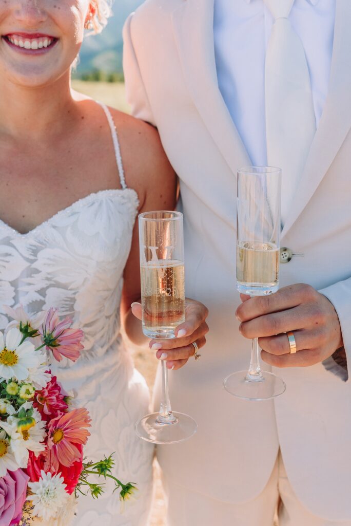 Cathedral View Turnout elopement ceremony Grand Teton National Park bride on horse Grand Teton elopement couple running down road Grand Teton elopement Jackson Hole micro wedding photographer how to get married in grand teton national park western wedding at Cathedral View Turnout horses in western wedding jackson hole