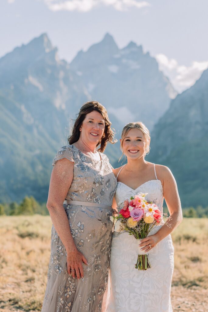 Cathedral View Turnout elopement ceremony Grand Teton National Park bride on horse Grand Teton elopement couple running down road Grand Teton elopement Jackson Hole micro wedding photographer how to get married in grand teton national park western wedding at Cathedral View Turnout horses in western wedding jackson hole