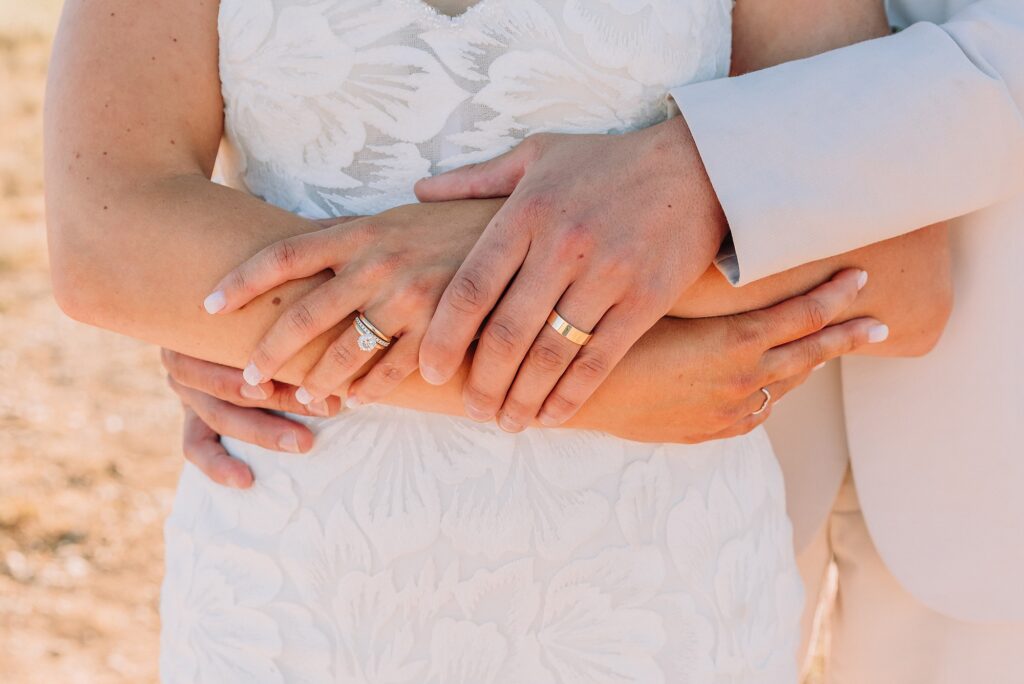 Cathedral View Turnout elopement ceremony Grand Teton National Park bride on horse Grand Teton elopement couple running down road Grand Teton elopement Jackson Hole micro wedding photographer how to get married in grand teton national park western wedding at Cathedral View Turnout horses in western wedding jackson hole
