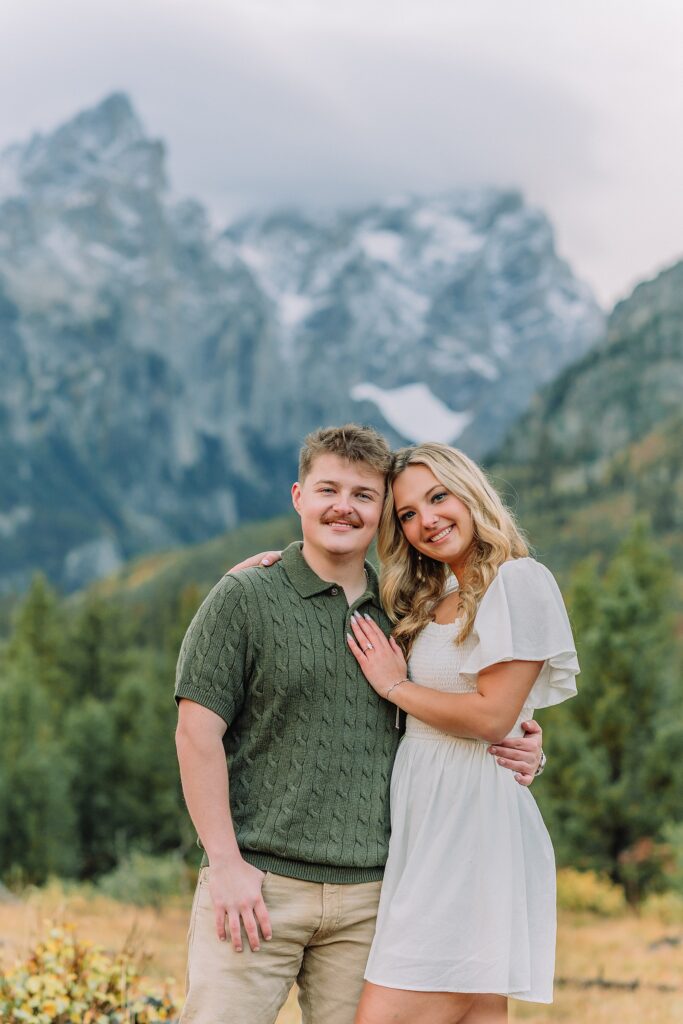 String Lake fall engagement photos Grand Teton National Park Rainy day engagement photos Grand Teton National Park fall Fall colors engagement session String Lake Wyoming mountains Couple getting engaged with Teton mountain peaks in background jackson hole engagement photographer