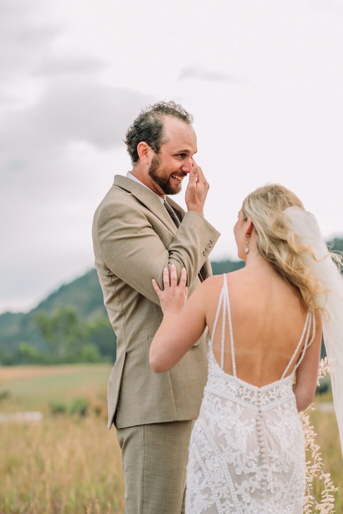 Mormon Row Grand Teton wedding ceremony cathedral veil alpine wedding photography fall colors Grand Teton elopement intimate outdoor micro wedding Wyoming champagne toast Grand Teton wedding celebration semi-formal outdoor alpine wedding attire first look Mormon Row Grand Tetons
