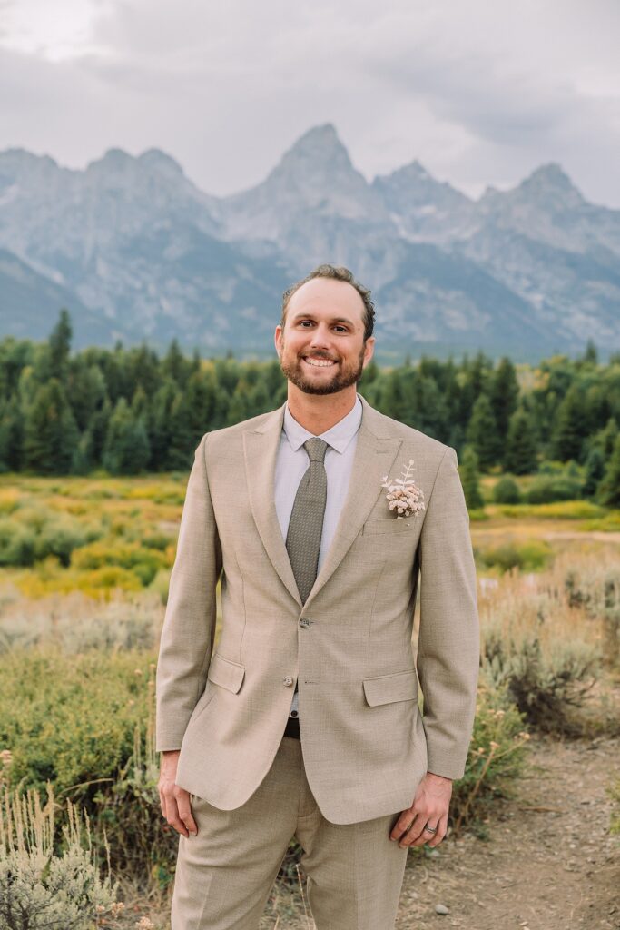 Jackson Hole micro wedding photographer Blacktail Ponds Overlook wedding portraits Wyoming Grand Teton wedding with moose wildlife September Grand Teton wedding fall colors dramatic cathedral veil sagebrush Teton backdrop