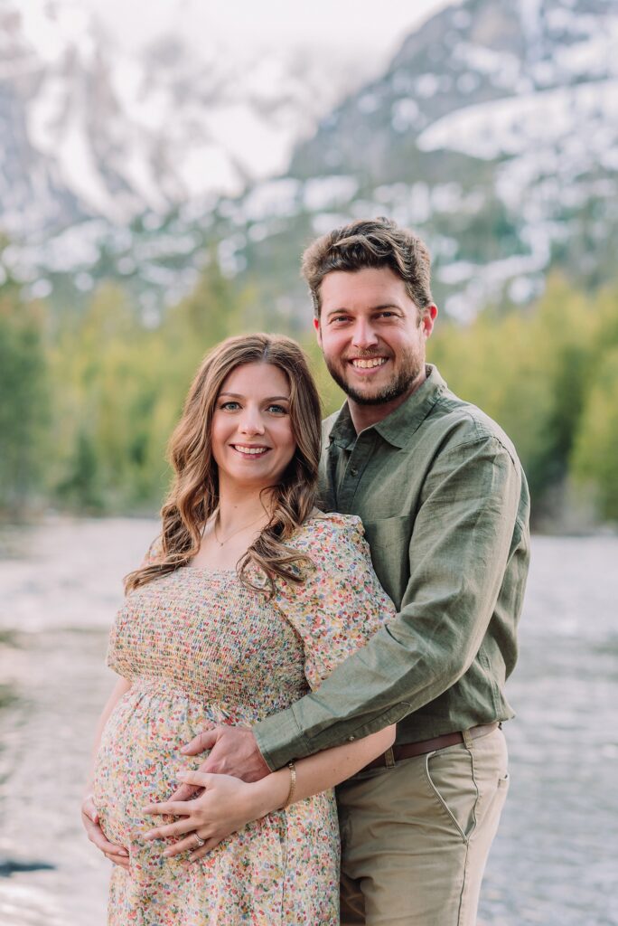 String Lake maternity photos with mountain backdrop String Lake pregnancy photos with water reflection Pregnant couple photos in Jackson Hole Wyoming May maternity photo session Grand Teton National Park Jackson Hole Family Photographer