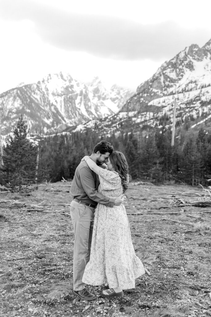 String Lake maternity photos with mountain backdrop String Lake pregnancy photos with water reflection Pregnant couple photos in Jackson Hole Wyoming May maternity photo session Grand Teton National Park Jackson Hole Family Photographer