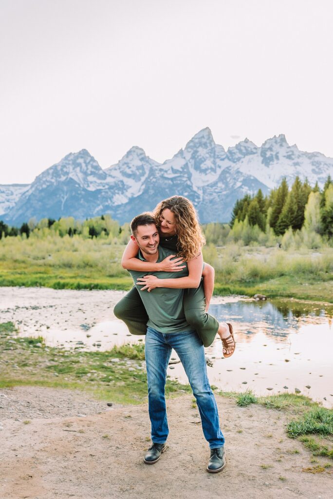 Schwabacher Landing sunset couples photography session green dress couples photos Schwabacher Landing reflections Teton mountain backdrop engagement photos Wyoming Jackson Hole Photographer Jackson Hole Couples Photography