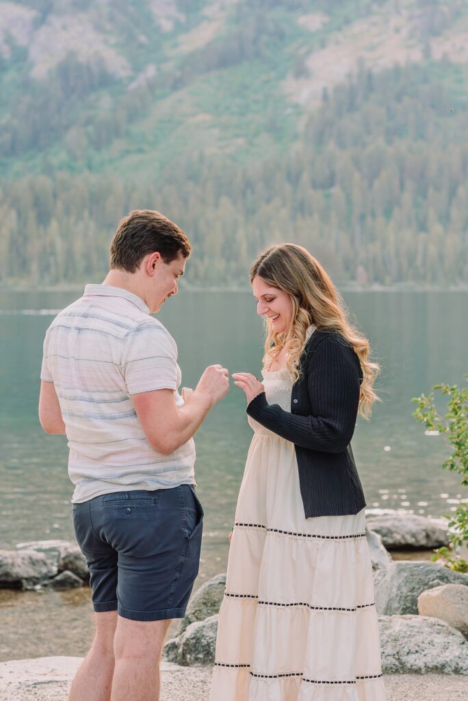 Jackson Hole Engagement Photographer grand teton national park proposal photography lakeside engagement portraits Jackson Hole surprise proposal photographer Grand Tetons Jenny Lake couple photos summer romantic Jackson Hole engagement session