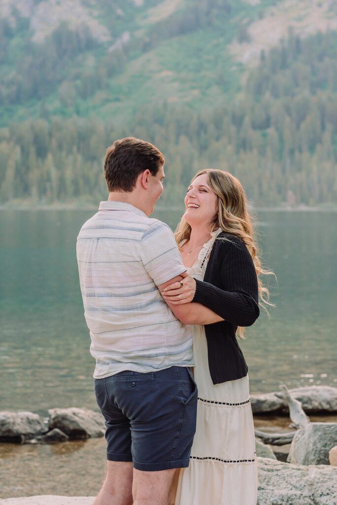 Jackson Hole Engagement Photographer grand teton national park proposal photography lakeside engagement portraits Jackson Hole surprise proposal photographer Grand Tetons Jenny Lake couple photos summer romantic Jackson Hole engagement session