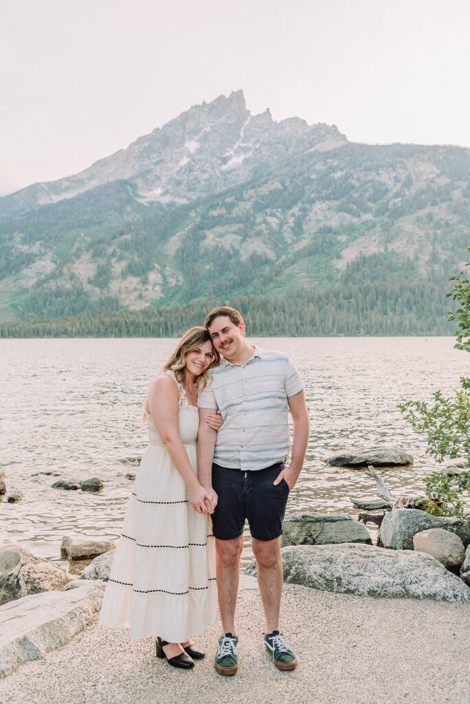 Jackson Hole Engagement Photographer grand teton national park proposal photography lakeside engagement portraits Jackson Hole surprise proposal photographer Grand Tetons Jenny Lake couple photos summer romantic Jackson Hole engagement session
