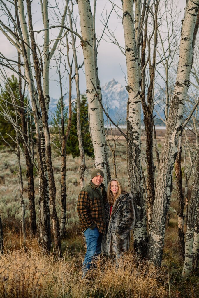 willow flats anniversary session with teton mountain views fall anniversary photos with aspen trees jackson hole jackson hole anniversary photographer capturing love stories luxury anniversary photography willow flats jackson lake views