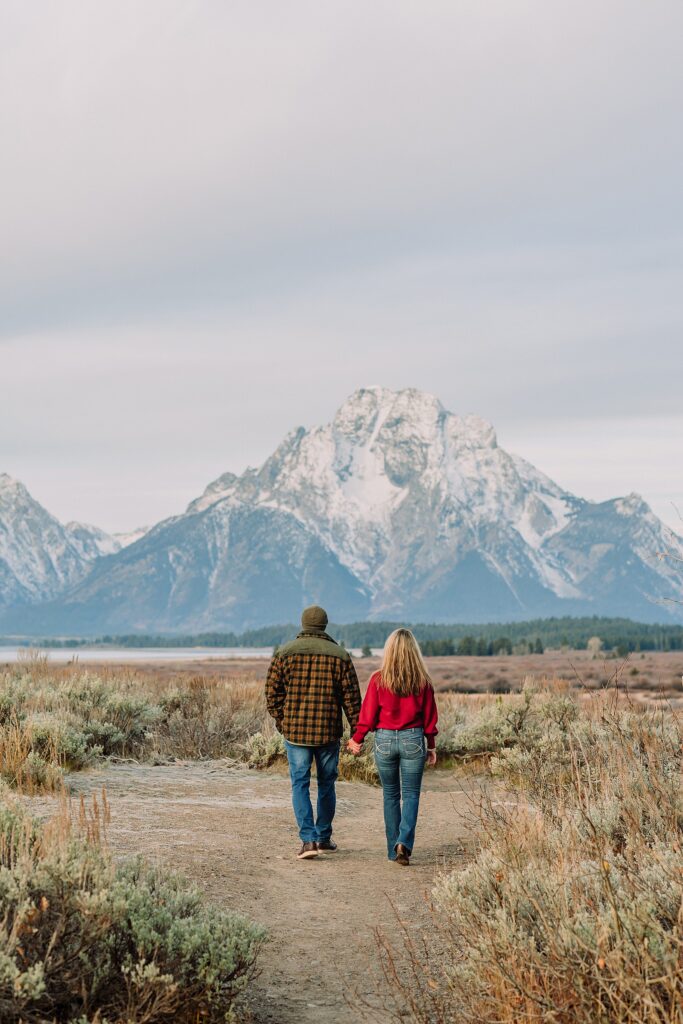 willow flats anniversary session with teton mountain views fall anniversary photos with aspen trees jackson hole jackson hole anniversary photographer capturing love stories luxury anniversary photography willow flats jackson lake views
