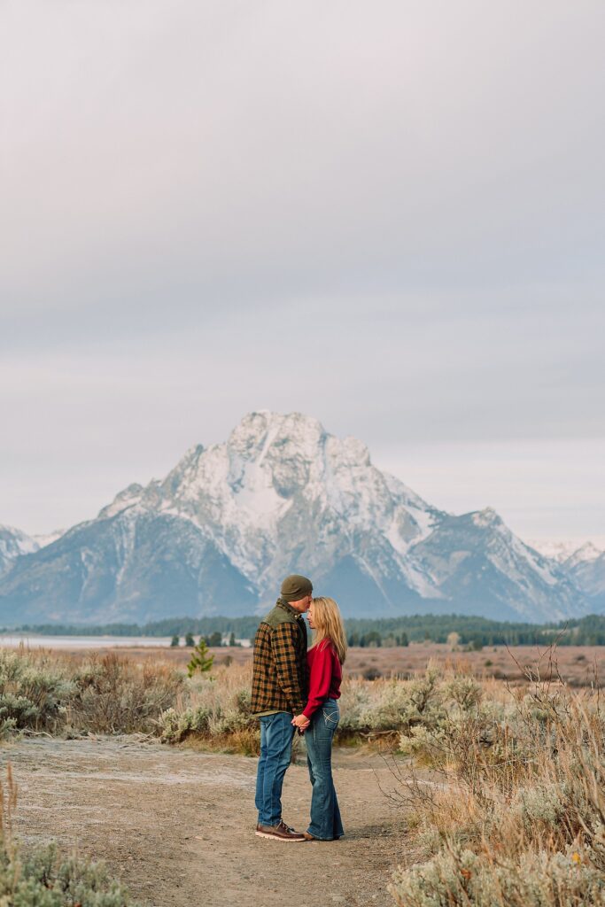 willow flats anniversary session with teton mountain views fall anniversary photos with aspen trees jackson hole jackson hole anniversary photographer capturing love stories luxury anniversary photography willow flats jackson lake views