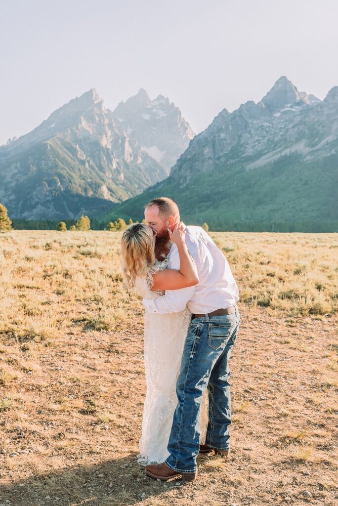Jackson Hole vow renewal at Cathedral View Turnout intimate mountain vow renewal ceremony Wyoming 10 year anniversary vow renewal Grand Tetons beaded wedding dress mountain vow renewal Cathedral View Turnout vow renewal photographer Grand Teton National Park intimate wedding ceremony